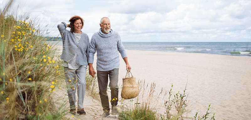 Couple enjoying retirement freedom together outdoors