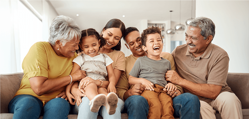 Family embracing warmly in natural daylight